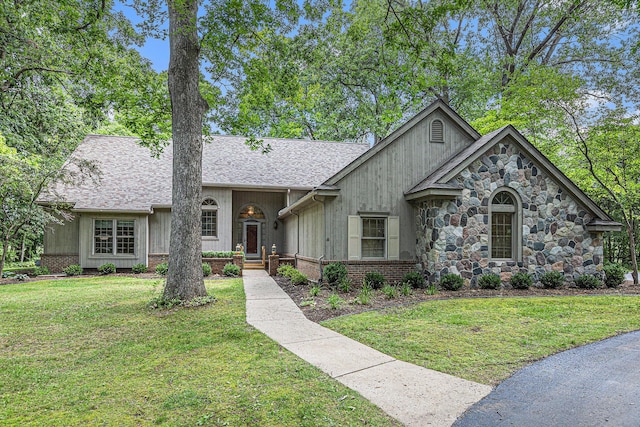 view of front of home with a front yard