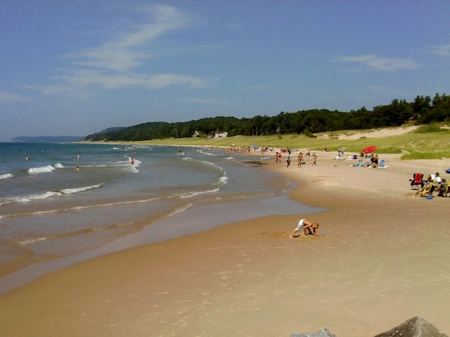 property view of water with a beach view