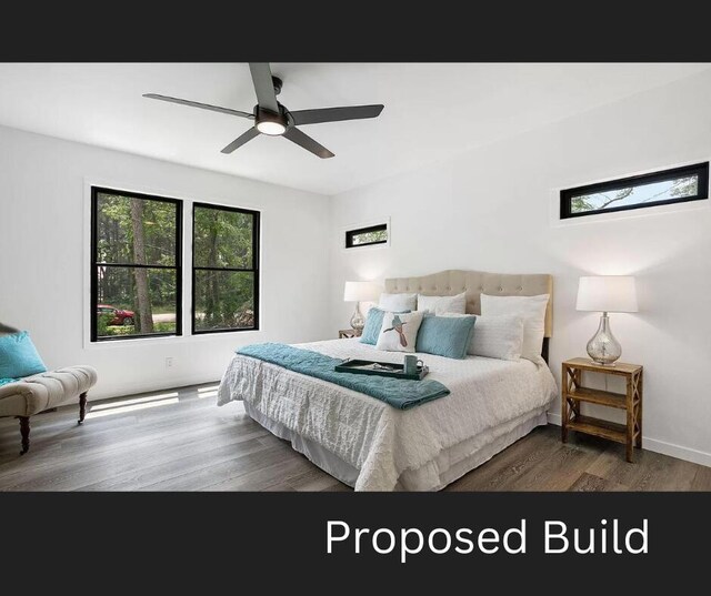 bedroom featuring hardwood / wood-style flooring and ceiling fan