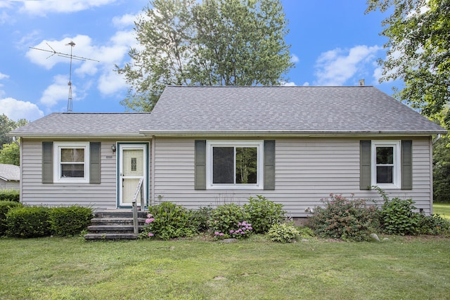 view of front facade with a front lawn