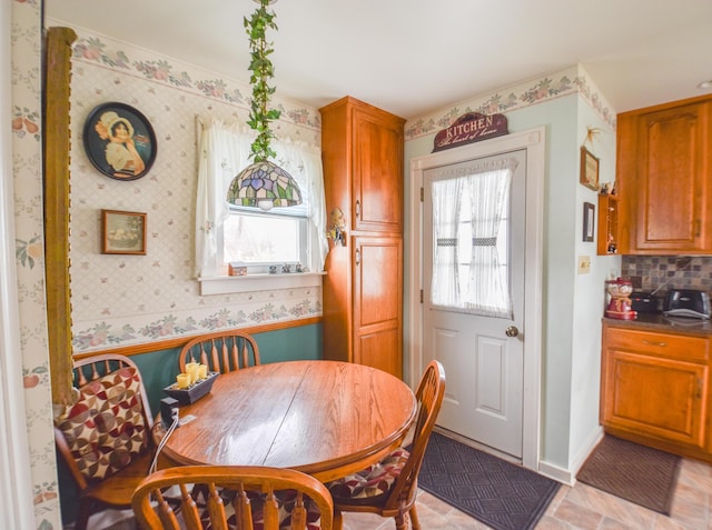 dining space with a healthy amount of sunlight