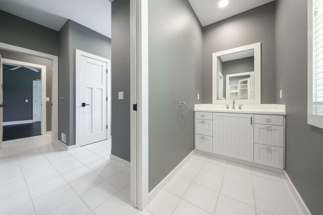 bathroom with tile patterned flooring and vanity