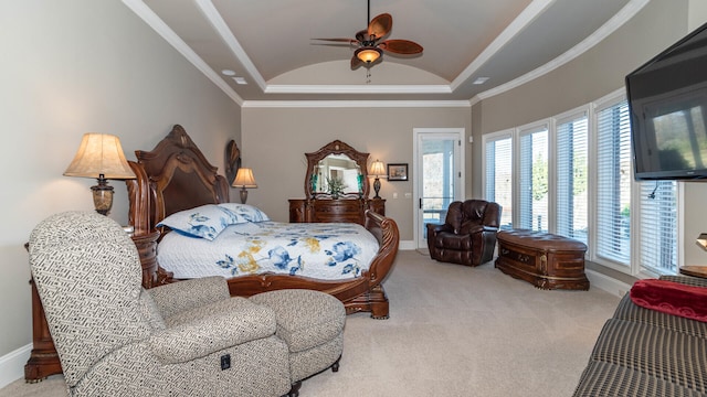 carpeted bedroom with ceiling fan, ornamental molding, and vaulted ceiling