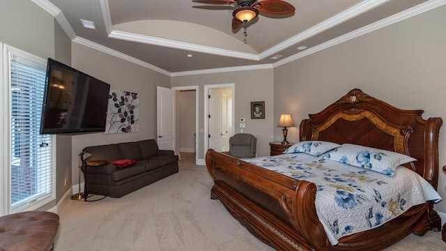 bedroom featuring lofted ceiling, ornamental molding, light colored carpet, and ceiling fan