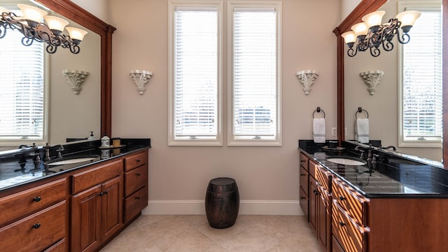 bathroom featuring tile patterned floors, plenty of natural light, and vanity