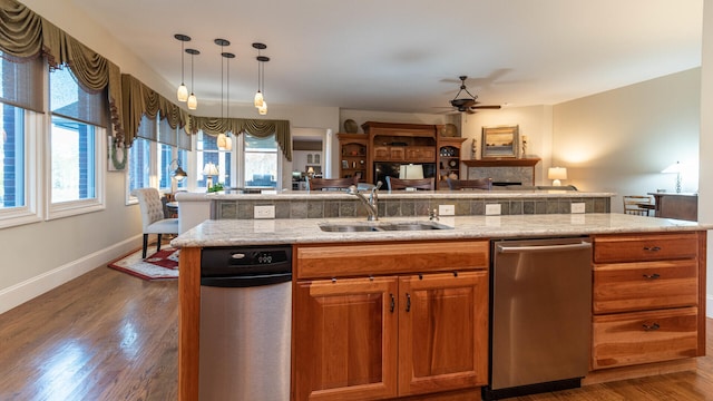 kitchen with ceiling fan, plenty of natural light, sink, and dark hardwood / wood-style floors