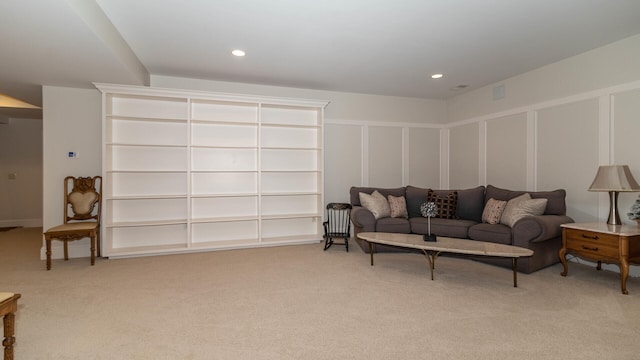 living room featuring light colored carpet