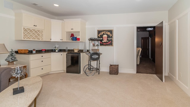 kitchen featuring dishwasher, fridge, and light colored carpet