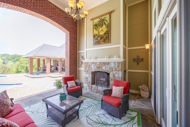 view of patio / terrace with an outdoor stone fireplace