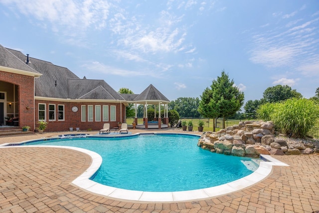 view of pool with a patio area