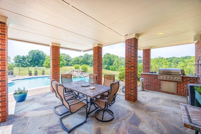 view of patio / terrace featuring an outdoor kitchen and area for grilling