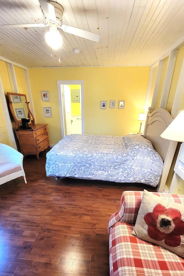 bedroom with wooden ceiling and wood finished floors