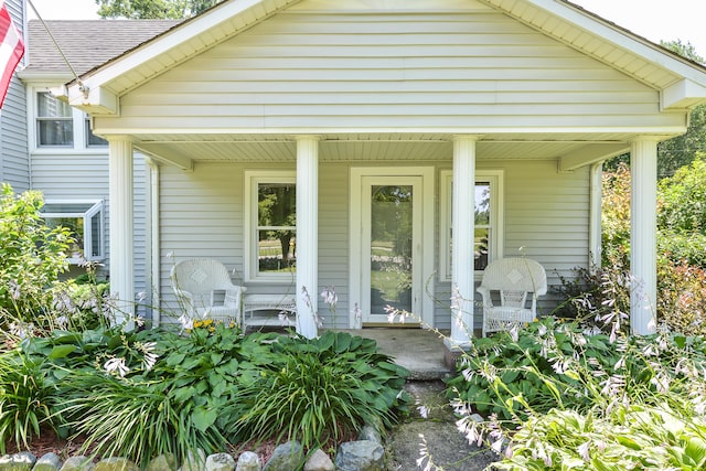 doorway to property featuring a porch