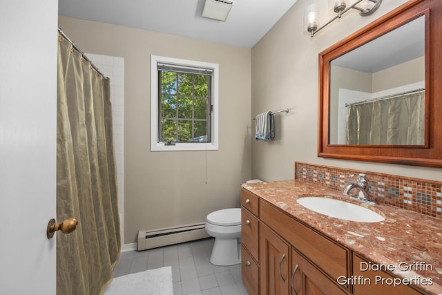 bathroom with tasteful backsplash, tile patterned floors, vanity, baseboard heating, and toilet