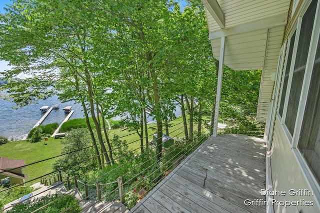 deck featuring a water view