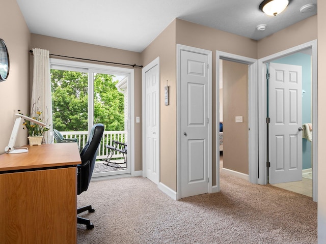 office area with baseboards and carpet floors