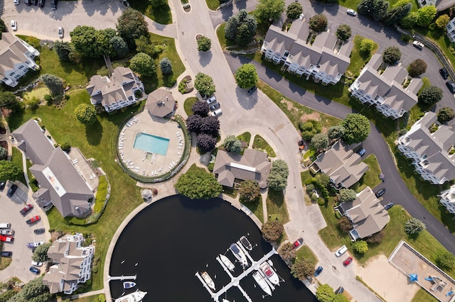 aerial view with a residential view and a water view