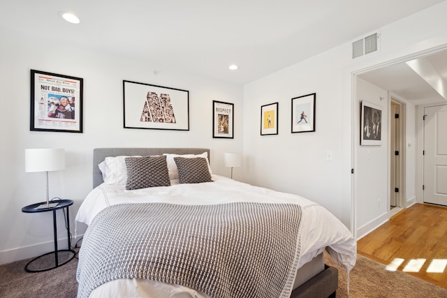 bedroom featuring hardwood / wood-style flooring