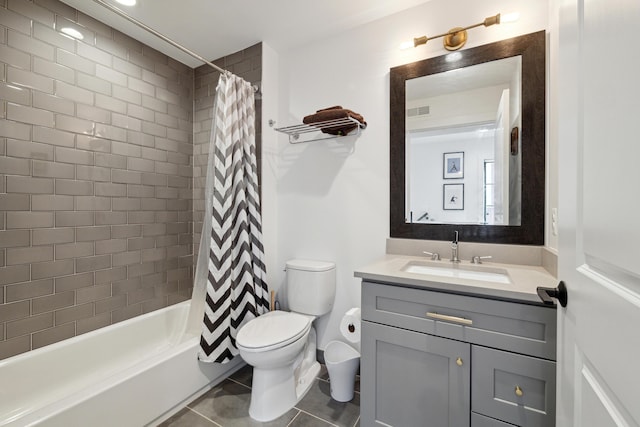 full bathroom with tile patterned flooring, vanity, toilet, and shower / tub combo with curtain