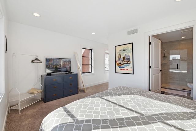 carpeted bedroom featuring connected bathroom