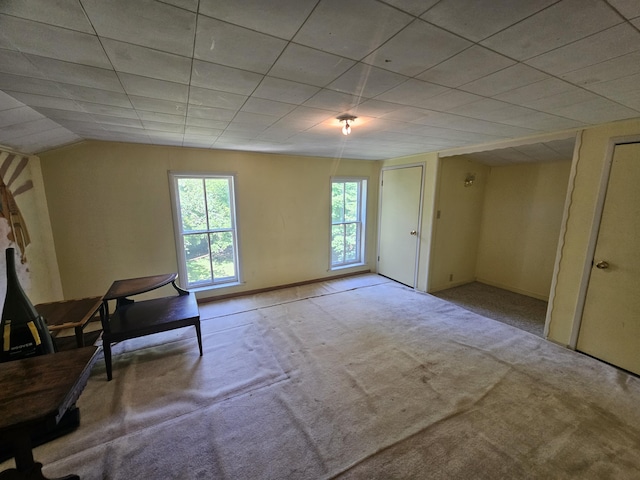 unfurnished room featuring light colored carpet