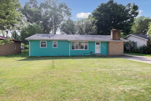 ranch-style house with a front yard