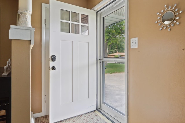 interior space with tile patterned floors