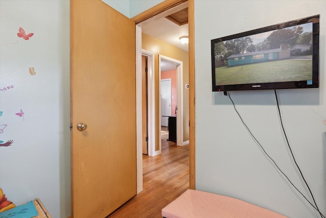 corridor featuring light wood-type flooring