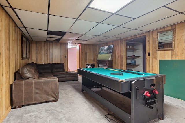 recreation room with a paneled ceiling, billiards, light carpet, and wood walls