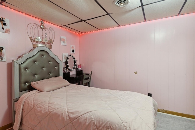 bedroom featuring a paneled ceiling