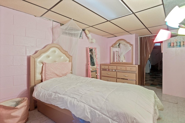 bedroom featuring a drop ceiling