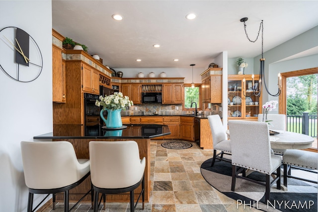 dining space with sink