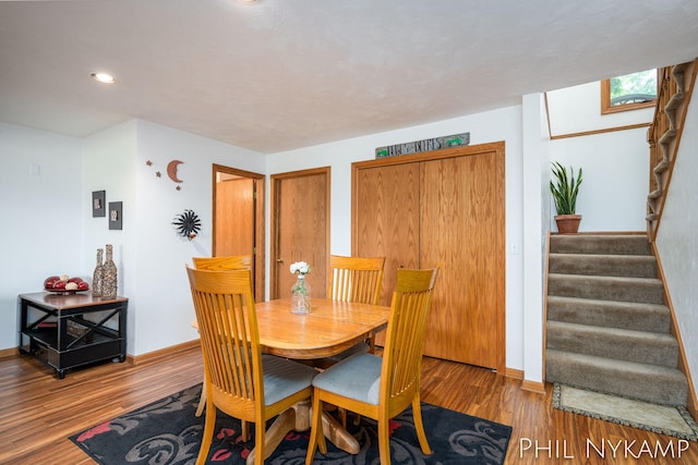 dining area featuring hardwood / wood-style flooring