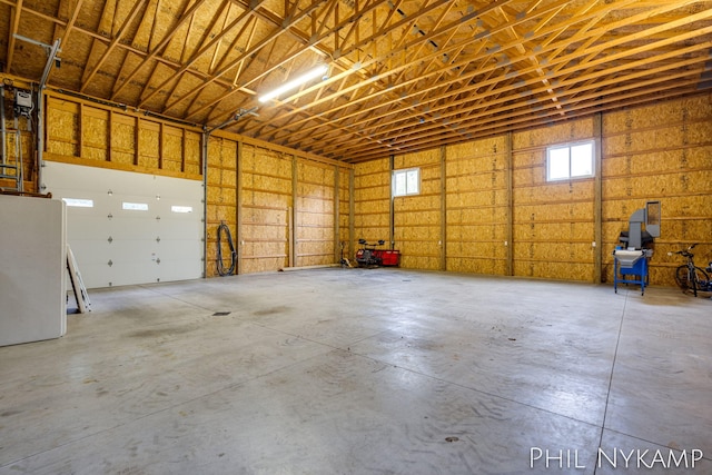 garage featuring fridge