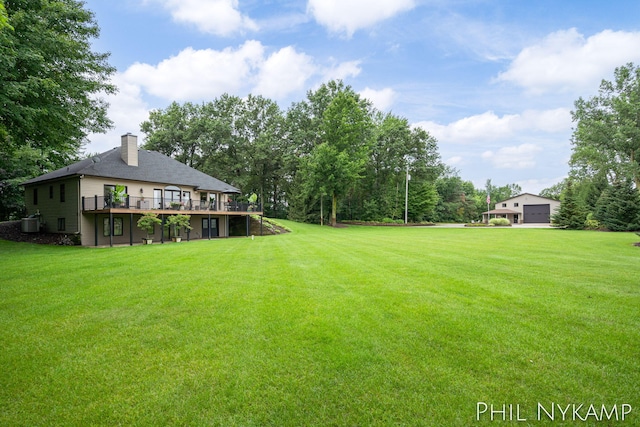 view of yard featuring a wooden deck