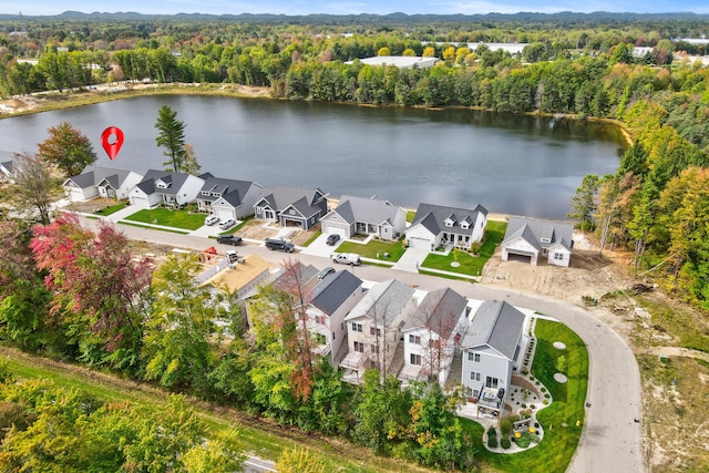 drone / aerial view with a water view