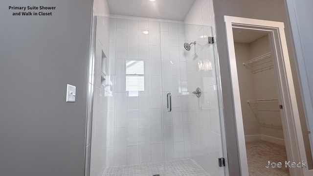 bathroom featuring an enclosed shower