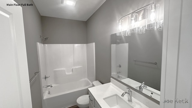 full bathroom featuring vanity, shower / tub combination, and toilet