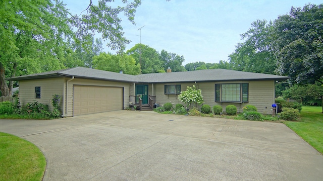 ranch-style home with a garage