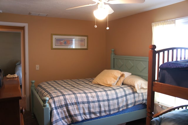 bedroom featuring ceiling fan