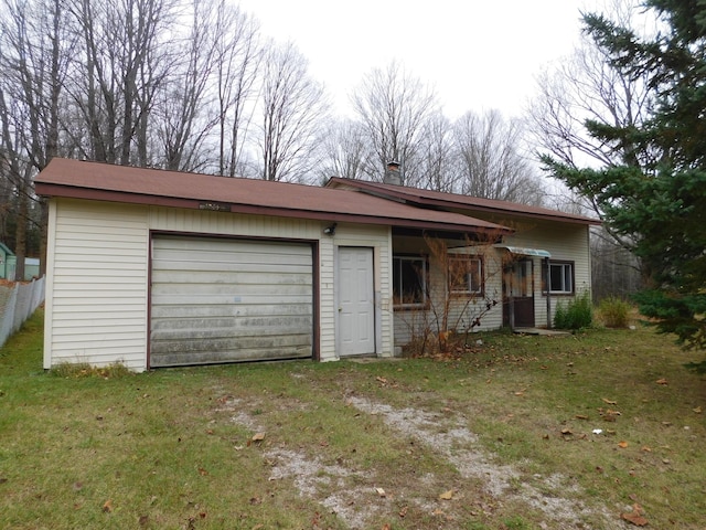 garage with a yard