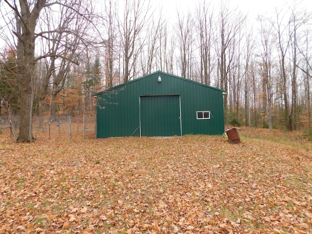 view of outdoor structure with a garage