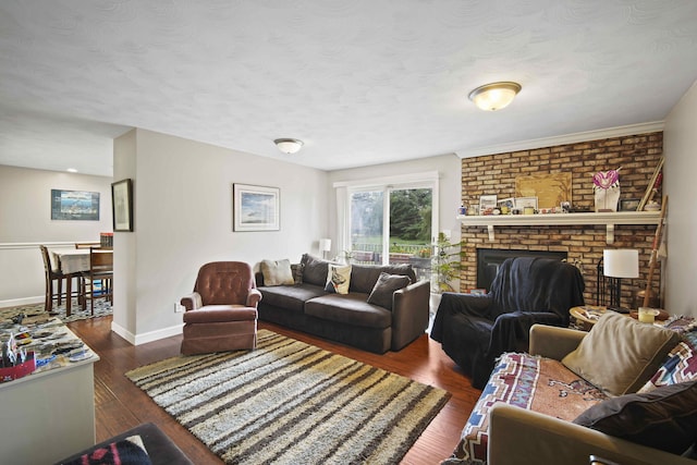 living room with a textured ceiling, a fireplace, and dark hardwood / wood-style flooring