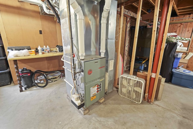 utility room with heating unit