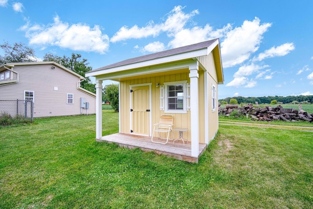 view of outdoor structure with a lawn