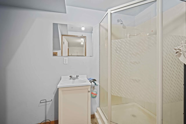 bathroom featuring vanity and walk in shower