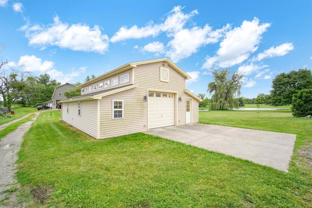 view of side of home featuring a lawn