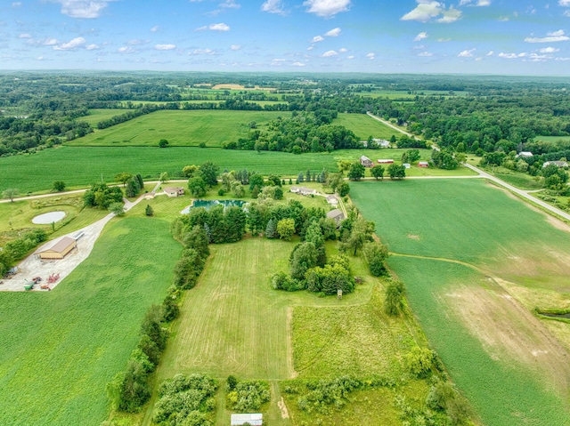 birds eye view of property featuring a rural view