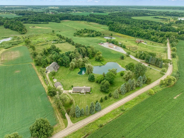 aerial view featuring a rural view and a water view