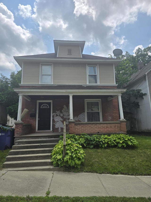 front of property featuring a porch